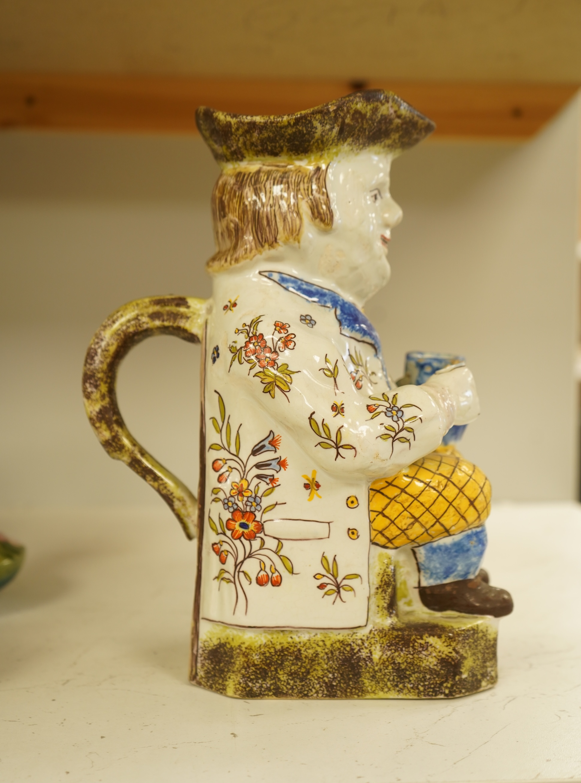 A French 'Rouen' Faience Toby Jug, 20th century, 25cm